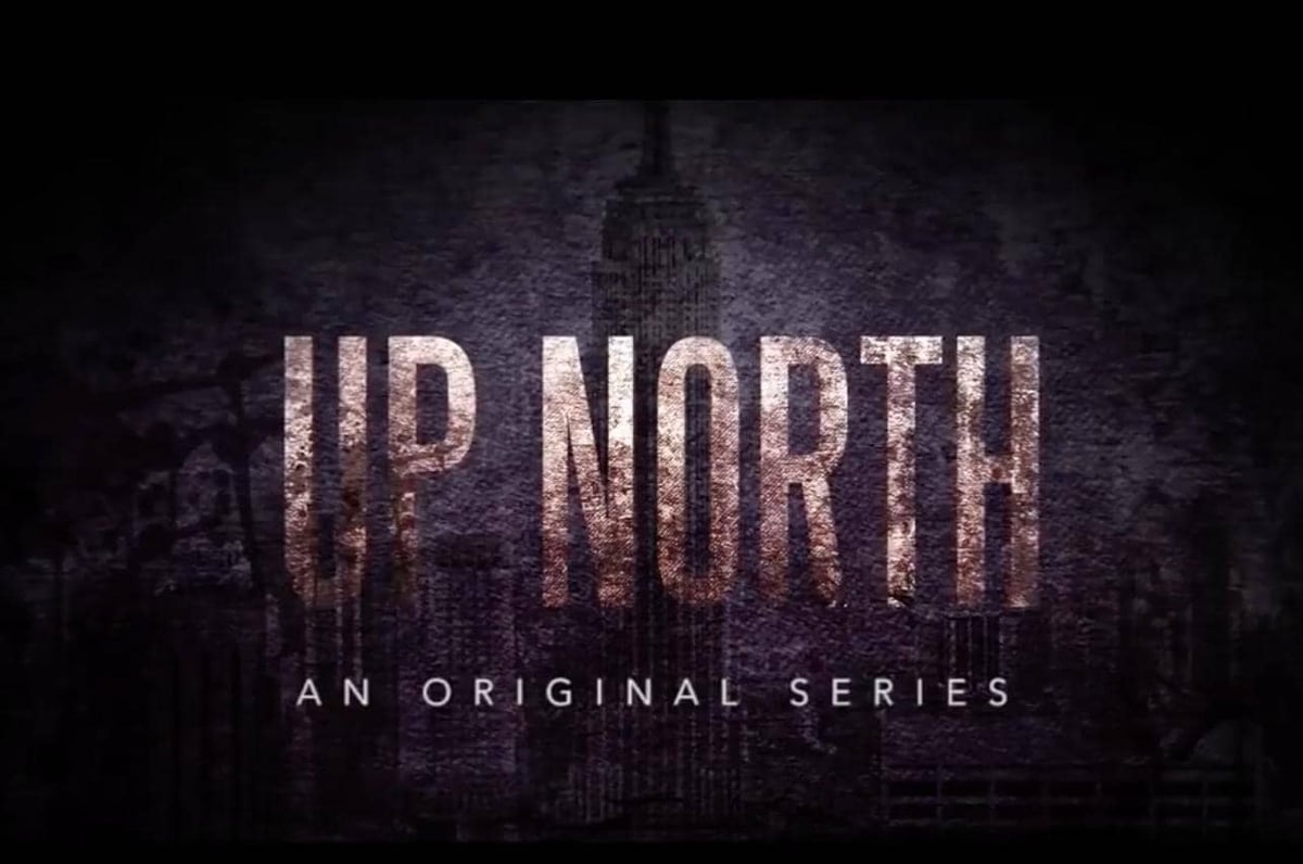 Up North tv series poster with city scape in background